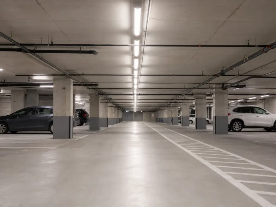 Underground condominium parking garage with continuous LED fixtures